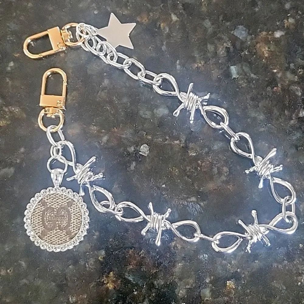 Authentic upcycled Gucci Handbag Charm. Handmade